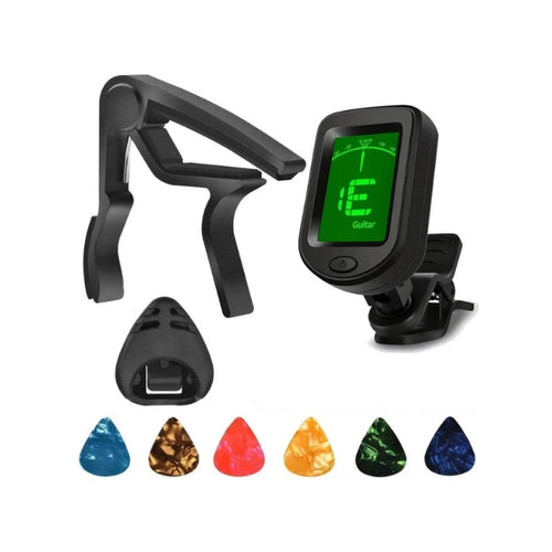 A black clip-on guitar tuner with a green digital display screen, shown alongside a black adjustable clamp, a black stand, and six colorful guitar pips in blue, brown, red, orange, green, and dark blue on a plain white background.